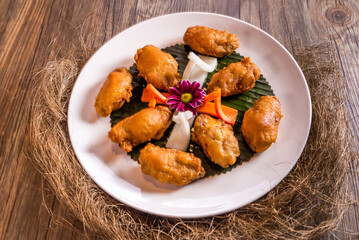 deep fried crispy pipa tofu beancurd on wood table appetiser in plate on wood table restaurant chinese banquet halal vegetable food asian cafe menu