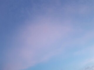 evening sky with pink clouds and rich blue color