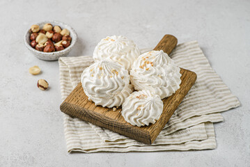 meringue on a wood on white background