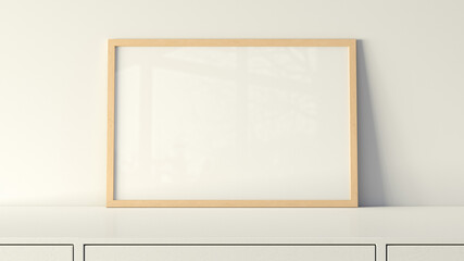 Horizontal frame poster mock up on the white table with white wall on background.