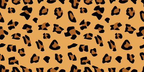 Seamless leopard fur pattern. Fashionable wild leopard print background. Stylish vector yellow and brown illustration