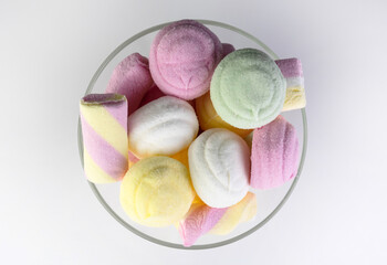 Colored marshmallow in a vase on a white background.Flet ley. © Olivka888