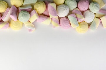 Colored marshmallow on a white background.Copy space.