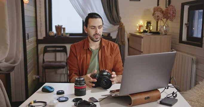 Young handsome man make technique review and webinar lecture for photographers.