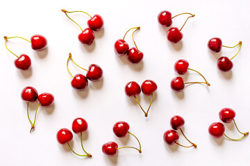 Obraz na płótnie Canvas double red cherries on white background summer