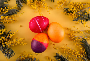 Fototapeta na wymiar Easter. Yatsa. Easter eggs on a yellow background. Yellow background. Bright holiday of Easter. Painted Easter eggs. colored eggs