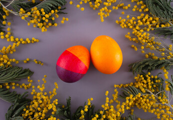 Easter eggs. Festive decoration. Easter. Celebration. Bright holiday. Eggs on a gray background. Multi-colored eggs on a gray background.