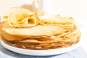 Yeast pancakes on a white plate