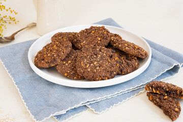 Oatmeal chocolate chip cookies on white plate