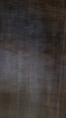 Abstract blur background with brown gray, black, white and earth tones.