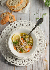 Vegetable soup. White rustic food photography, cottage styling