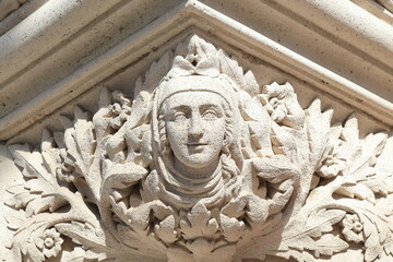 Amsterdam Rijksmuseum Exterior Sculpted Detail with Head, Leaves and Flowers, Netherlands