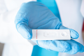 lateral flow test,blood antibodies coronavirus in the hands of a doctor