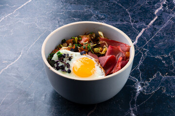 English breakfast fried egg, beans, tomatoes, mushrooms, bacon