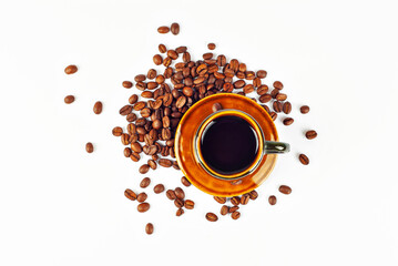 Ceramic brown coffee mug close up. Coffee isolated on a white background. Coffee beans are scattered near the drink.