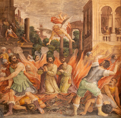 ROME, ITALY - AUGUST 30, 2021: The fresco of martyrdom of St. Cosmas and Damian in the church...