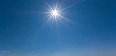 sparkle sun on blue sky, natural sky background