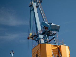 Fototapeta na wymiar Port crane at a thermal power plant.