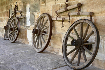 Wheel of Time. Vintage Black and White Picture of old wooden wheels on a castle in Bavaria, Germany Europe .
