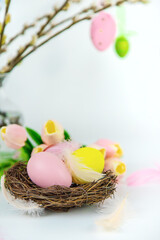 Fototapeta na wymiar Beautiful Easter decor on a white background. Selective focus.