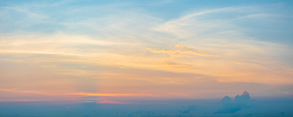 Panorama photo of clouds or cloudscape at sunset or evening time. with blue sky.