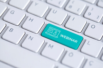 Webinar text and symbol on computer keyboard