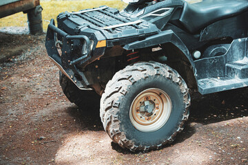 Fototapeta na wymiar Dirty ATVs after cross-country trips and rides
