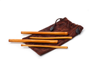 Four bamboo sticks to massage the face and other parts of the body.