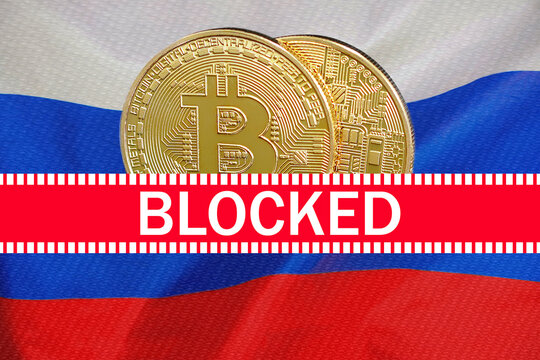Bitcoins tocken with word of blocked on Russia flag background. Financial sanctions crypto currency against in Russia
