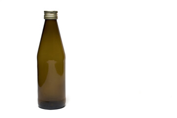 Closeup brown glass milk bottle white background
