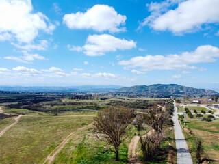 Fototapeta na wymiar A Beautiful View of a california Rural Town on a Puffy Cloud Day in a Blue Sky