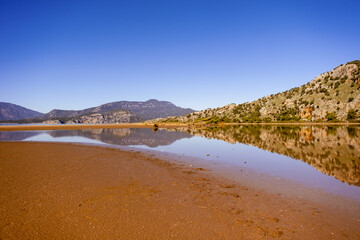 beach lake and mountains