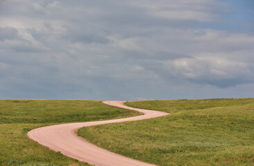Road Less Traveled with a Packed Dirt Road in the Midwest © dejavudesigns