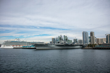 Fototapeta na wymiar The San Diego, California, Embarcadero with the USS Midway Moored and the Downtown Skylin