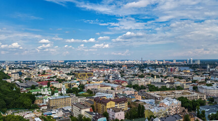 Fototapeta na wymiar Kyiv cityscape aerial drone view, Dnipro river, downtown and Podol historical district skyline from above, city of Kiev and Dnieper, Ukraine
