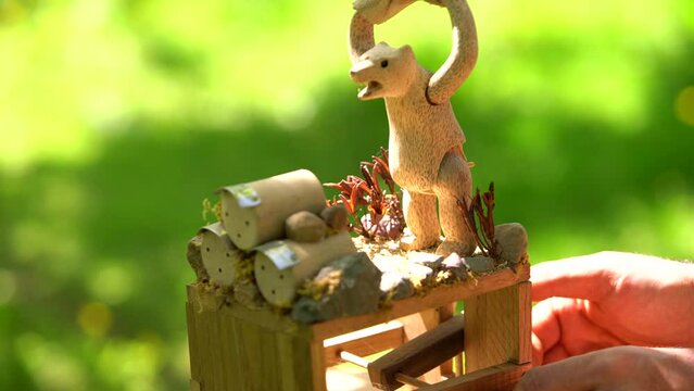4K wooden teddy bear, attacking beehives.