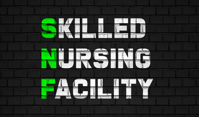 Skilled nursing facility(SNF) concept,healthcare abbreviations on black wall