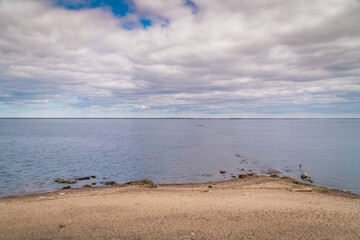 Fototapeta na wymiar Russia. April 21, 2020. View of the Gulf of Finland and the ring road from Kronstadt.