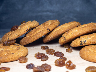 Oatmeal cookies . Cookies with raisins on the table. Raisins on the table. Sweet treat. Healthy diet.