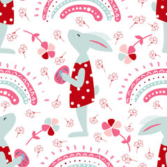 Festive seamless pattern with cute Easter bunnies with colored eggs and a rainbow. Used for printing on paper, fabric, packaging, wallpaper. Eps10.