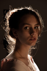 Beautifull woman portrait in warm light