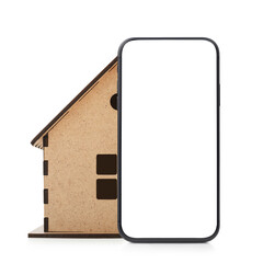 Smartphone and wooden house on a white background.Smart home concept.