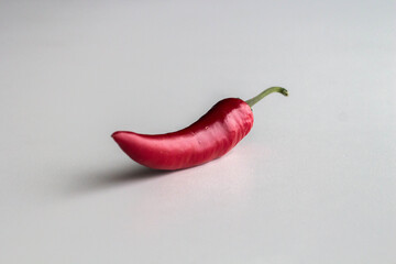 Red chili pepper on white background.