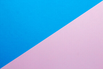 Abstract background with colored paper blue with pink color.