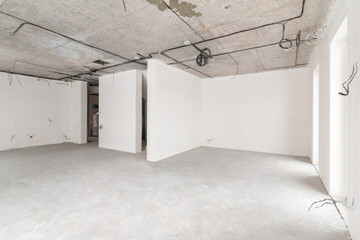 Finishing work in a country house repair of the initial stage white concrete