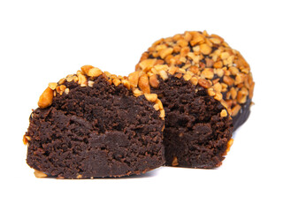 Cake rum truffle two balls with chopped nuts isolated on the white background