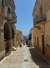 Traditional alleys in Ermoupoli, the capital of Syros overlooking the harbor, Cyclades, Greece
