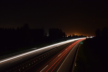 Fototapeta na wymiar Traffic light on highway at night