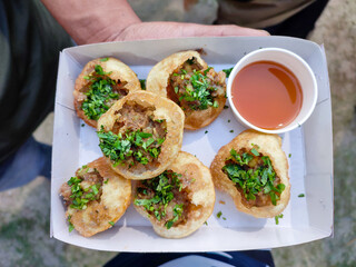 Golgappa panipuri Khatta mittha fuchka a spicy Indian snacks ready to be eaten