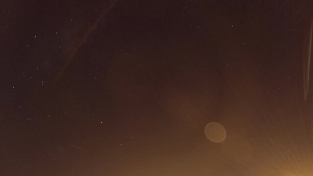 Bokeh moon light n star particles in night sky space TimeLapse